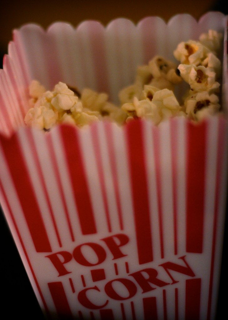 Buttery popcorn is an essential for a movie night at home. Photo by Ginny (under CC BY-SA 2.0, no changes have been made.)