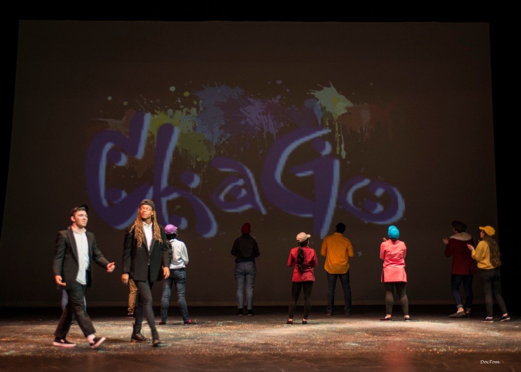 Don’t wait — excavate!: Gavin Perrine and Mykal Sullivan, foreground, with members of the “Chasing ‘ChaGo’” ensemble (photo by Doc Tom).
