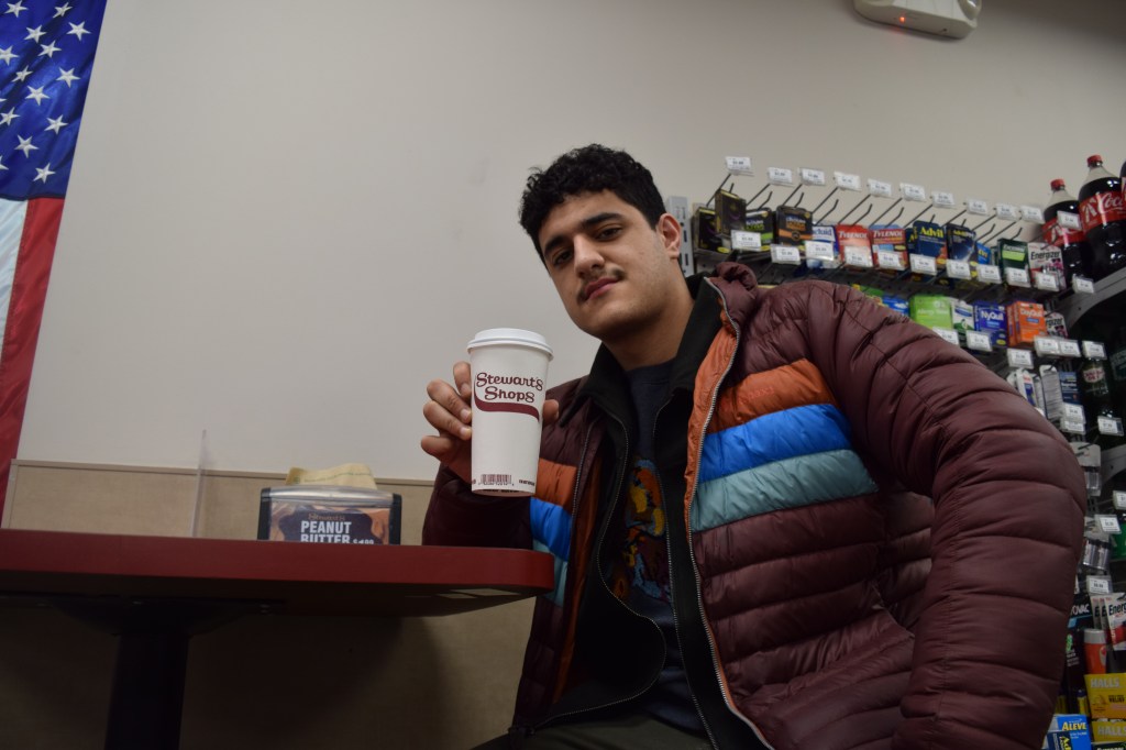 APN's Evan Rando enjoying a cup of Stewart's coffee 
